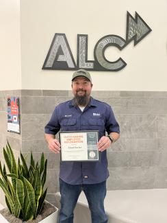 chad holding certificate