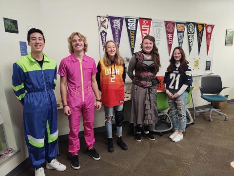 5 students in costumes