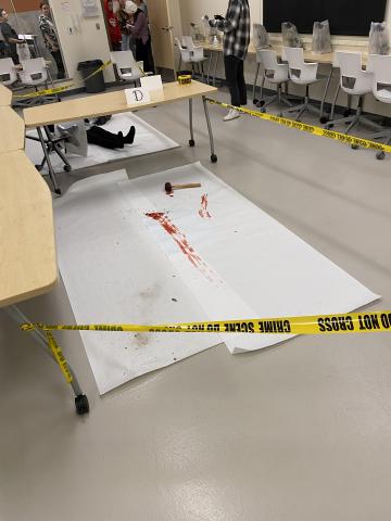 Crime scene with hammer and blood