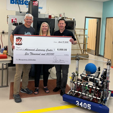 Haas Grant Check And Teachers