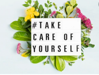 Flower with take care of yourself sign